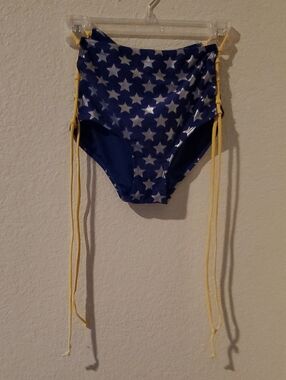 Wonder Woman Blue Swim Bottom with Silver Stars and Yellow Lace Up Sides